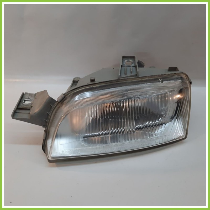 Faro Fanale Proiettore Anteriore Sinistro SX HELLA FIAT PUNTO 1a Serie 46402650 Usato