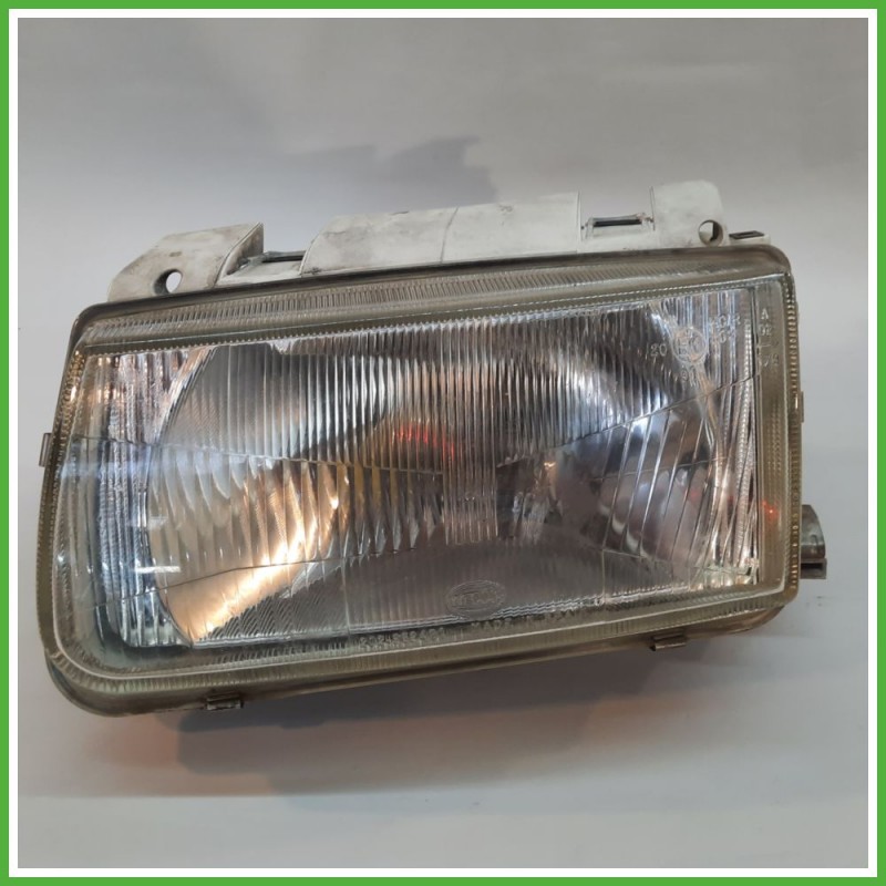 Faro Fanale Proiettore Anteriore Sinistro SX HELLA VOLKSWAGEN POLO 3a Serie 96249500 Usato