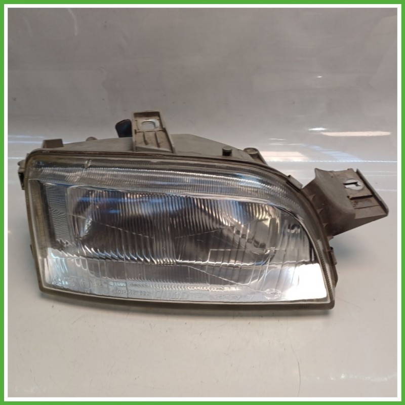 Faro Fanale Proiettore Anteriore Destro DX HELLA FIAT PUNTO 1a Serie 46481413 Usato