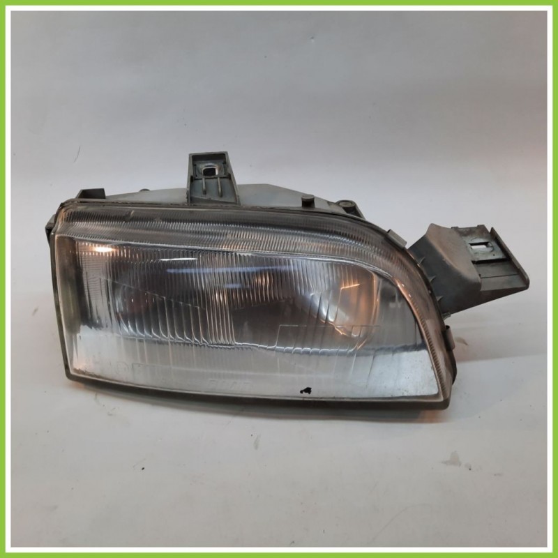 Faro Fanale Proiettore Anteriore Destro DX HELLA R142598-00 FIAT PUNTO 1a Serie 46433209 Originale Usato